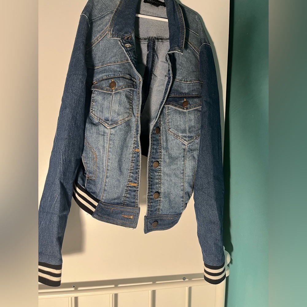 Tinseltown Denim Couture jean jacket. Dark blue with black and white accents.